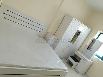 We are selling wood Bedroom set brand new available