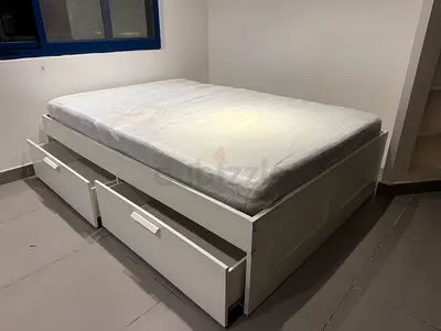 600 AED Moving out Sale !! Queen Size IKEA bed with big drawers and mattress