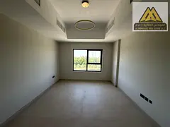 Luxurious apartment for annual rent | Two bedrooms and a living room in Al Zahia | Great space and s