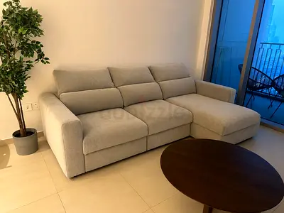 Light grey L-shaped 3-seater fabric sofa with chaise — good condition