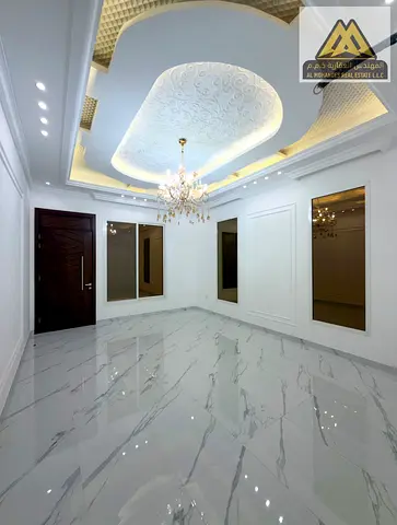 A spacious villa is available for annual rent in Al Helio 1- 4 Spacious Bedrooms Large Majlis 2 Living Halls 2 Kitchens Outdoor Seating Area roof