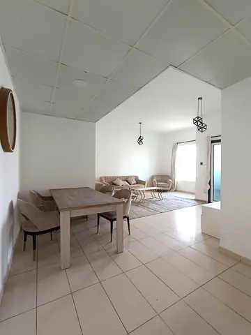 For rent in Al Majaz 3 Al Qasba Sharjah two master bedrooms with hall 3 bathrooms balcony with direct views of Al Majaz and Al Qasba lakes free gym po