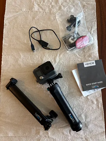GoPro Hero action camera with 2x GoPro grips/short poles and accessories