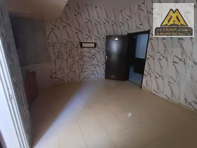 Studio in Al Nuaimiya 2 with balcony, large space. AED 17K yearly, central AC, 4 payments, free maintenance, prime location near King Faisal Street, r