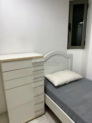 In Sheik Zayed Road , Maid-room with private bathroom for rent .