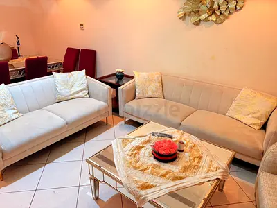 Light beige 4-piece sofa set with glass coffee table - good condition