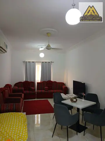 Two bedrooms and a large living room, furnished, with one bathroom.