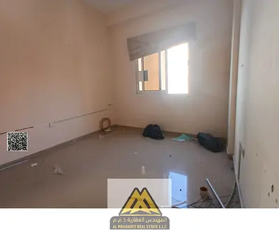One bedroom Jurf 2 Ajman one bath closed kitchen central AC free maintenance 28000 six payments