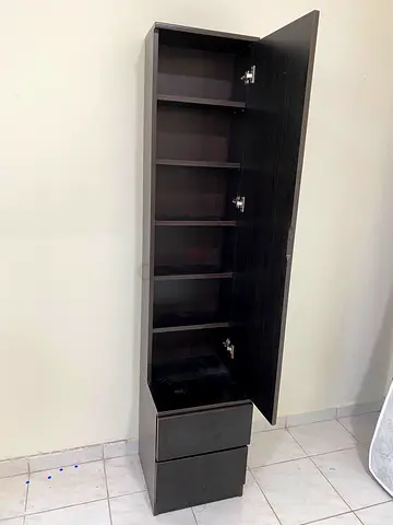 Tall narrow storage cabinet with drawers - dark wood