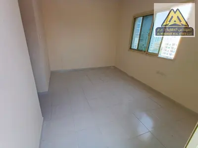 1-bedroom apartment with a hall in Al Rashidiya 2, balcony, large space, central A/C, family building. AED 30,000 yearly, payable in 6 installments