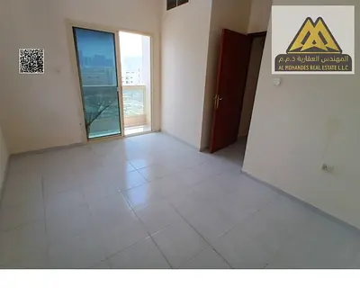 1-bedroom apartment with a hall in Al Rashidiya 2, balcony, large space, central A/C, family building. AED 30,000 yearly, payable in 6 installments