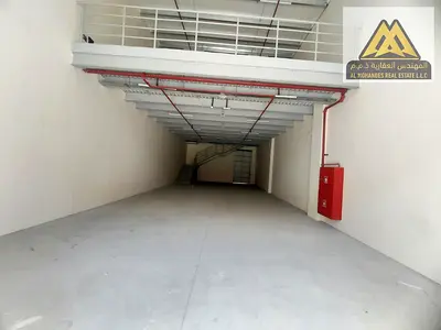 Warehouse with Mezzanine for Rent in Al Jurf Industrial 1, Ajman in a Prime Location Suitable for Various Business Activities