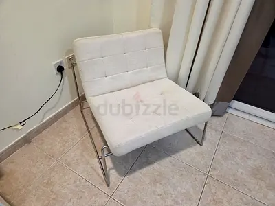 Modern tufted lounge chair with chrome legs - light beige
