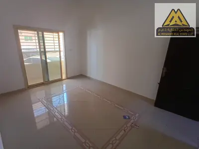شقة أرضية غرفتين وصالة بتكييف مركزي وبلكونة للإيجار السنوي في الروضة 3 عجمان