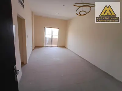 Apartment in Al Rashidiya 2 Ajman 1BR balcony central AC free maintenance 26k yearly 4 payments.