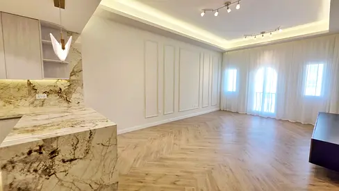 Exquisite Urban Living: Newly Renovated 2BR in Discovery Gardens