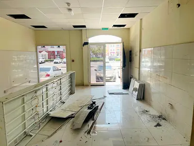 ✨ محل تجاري مطل على الطريق | 462 قدم مربع | المدينة العالمية