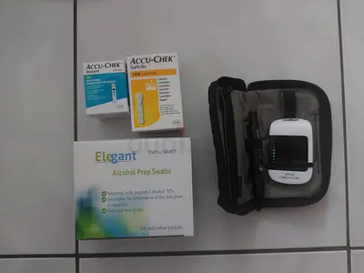 Accu-Chek blood glucose meter with test strips, lancets and alcohol swabs