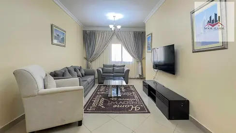 Sharjah, Al Taawun: Apartment featuring two bedrooms, a living room, a kitchen, three bathrooms, a maid's room, and a balcony.