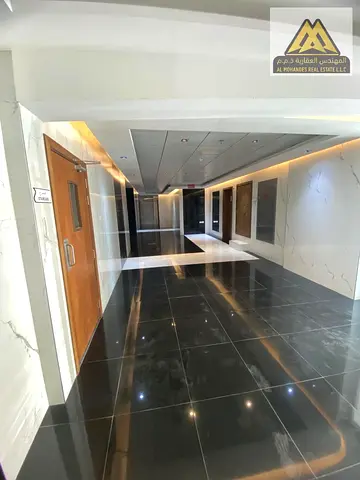 A well-designed 1-bedroom apartment in a prime location behind Al Hamidiya Police Station