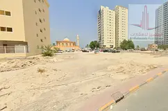 Residential/commercial land for sale in Al Nakheel 2 area. Excellent location. The land overlooks th