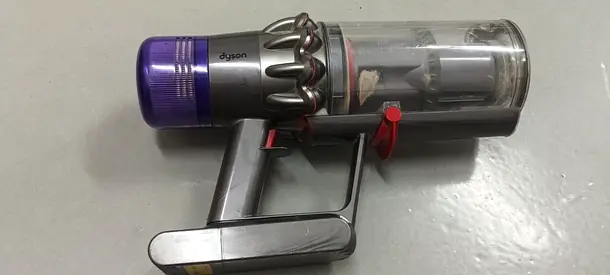 Dyson handheld cordless vacuum (used) - compact bin model