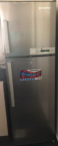 brand new WestPoint fridge and electric cooking range and used cooking range
