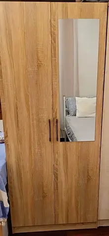 02 Two-door wooden wardrobe with one full-length mirror - good condition for Sale price only 250 Aed