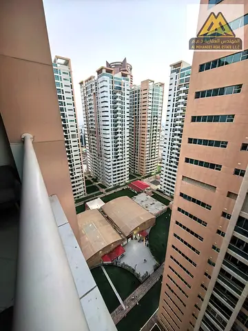 Premium 2-Bedroom Apartment for Sale on Flexible Installments in Ajman One Towers - Ajman (High Floor, Tower 2, Massive 1,750 Sq. Ft., 3 Bathrooms