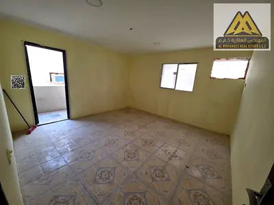 4-bedroom apartment in Al Yuwara 2, behind Orient Towers, hall, 3 bathrooms, 2 balconies. AED 60,000 yearly, payable in 4 installments, no AC.
