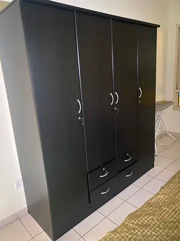 must go today! Spacious black 3 door wardrobe with storage drawers