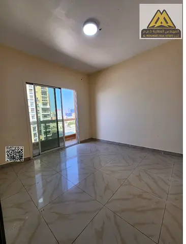 2 bedroom hall in Al Nuaimiya 1, Ajman, balcony, central AC, free maintenance, AED 32,000 yearly, 4 payments.