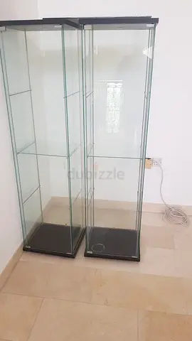 Pair of Tall Glass Display Cabinets with Black Bases