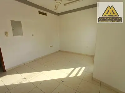 A great opportunity for annual rent in Al Rashidiya, Ajman. This spacious two-bedroom apartment offers a practical layout