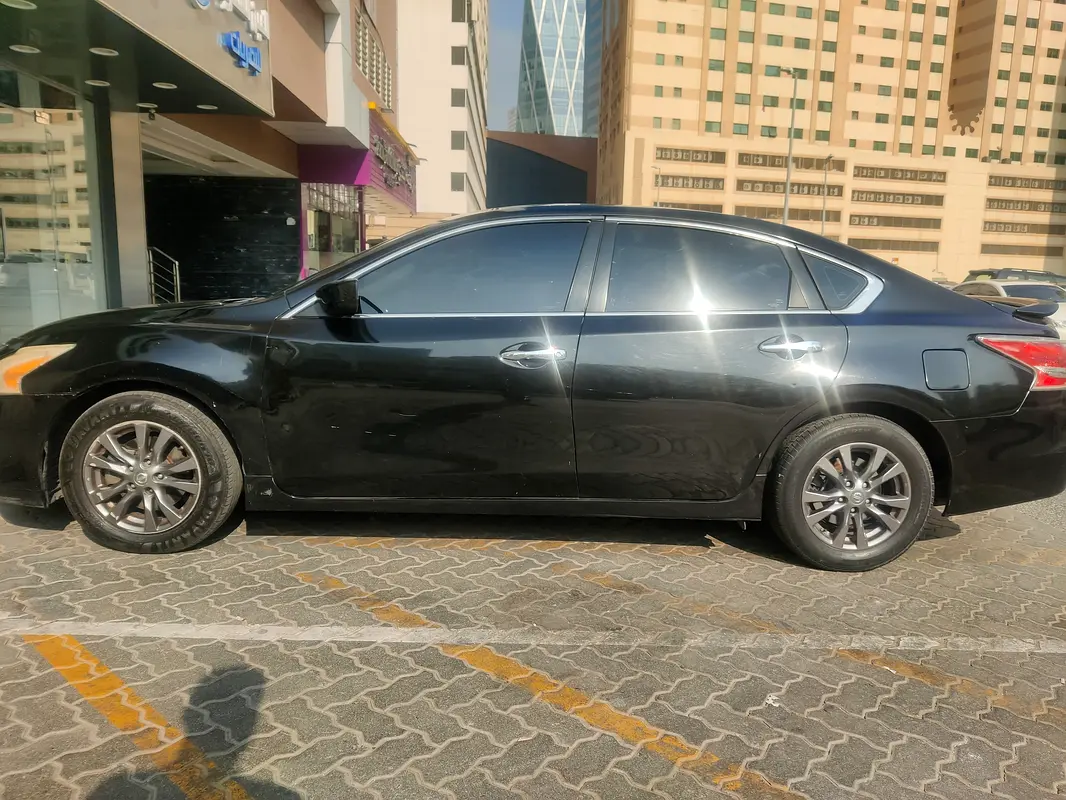 Nissan Altima 2015 — photo 1 of 5