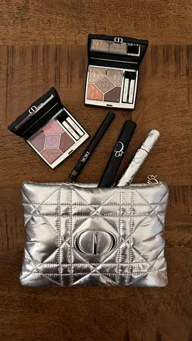 Dior makeup lot with silver quilted cosmetic pouch - eyeshadow palettes, mascara, lip liner