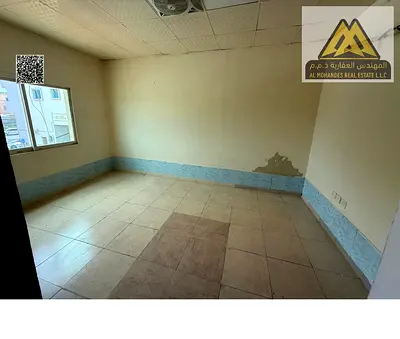 Studio Al Mowaihat 3 separate kitchen split AC free maintenance AED 18K yearly 4 payments near Dubai and Sharjah prime location ready to move in econo