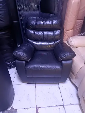 Black leather recliner armchair - comfortable single seat, good condition
