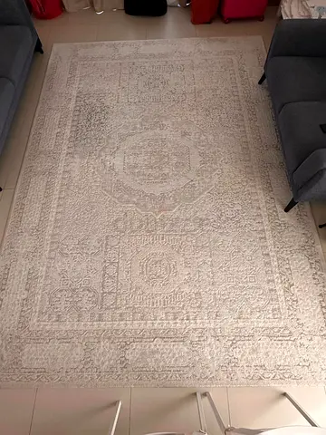 Light beige vintage-style area rug - good condition