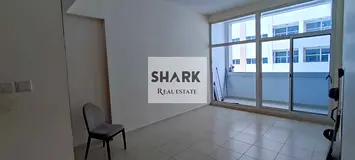 A spacious 1-bedroom apartment with a living room is available for sale in Ajman One Tower 3, offeri