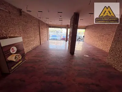 محل تجاري للإيجار في النخيل بعجمان بمساحة 1500 قدم ثاني نمرة من كورنيش عجمان ومناسب لجميع الأنشطة التجارية