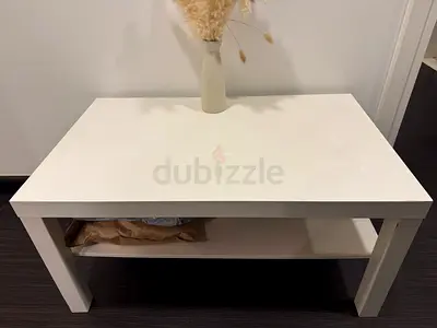 White rectangular coffee table with lower shelf - good condition