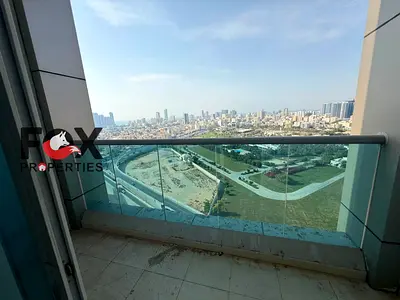 Enjoy upscale accommodation in Al Nuaimiya 3 | Two bedrooms, living room with balcony, open view, a