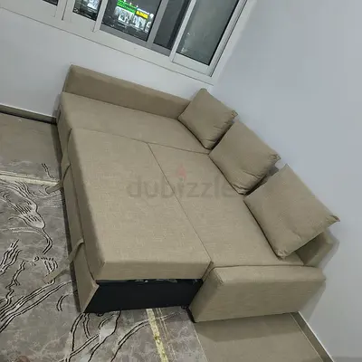 ikea L shape  sofa cum bed with big storage  and you can  fix the storage left or right any side