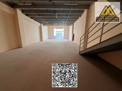 A spacious commercial shed suitable for various light commercial or industrial activities. It features a practical layout that provides ample workspac