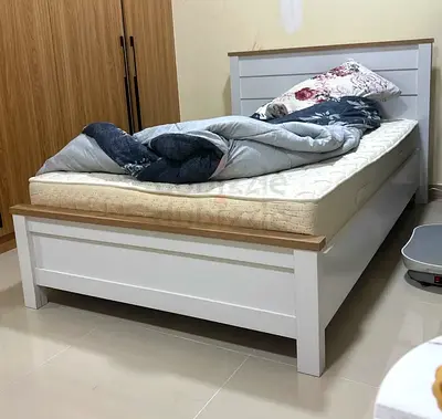 Single white wooden bed frame with mattress and side bed table perfect condition