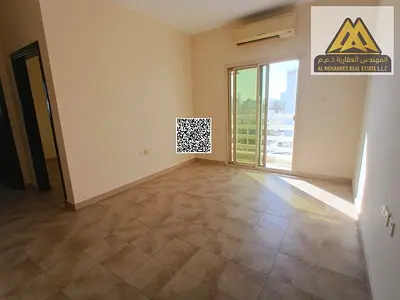 Spacious apartment with a balcony and open view in a vibrant location in Al Rashidiya, close to all amenities, at an affordable price
