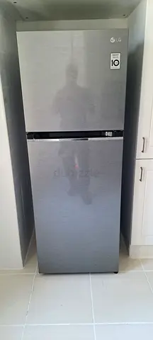 LG stainless steel refrigerator - good condition, single door freezer bottom