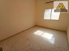 A spacious studio apartment with a separate kitchen, located on Sheikh Ammar Street, offering a stra