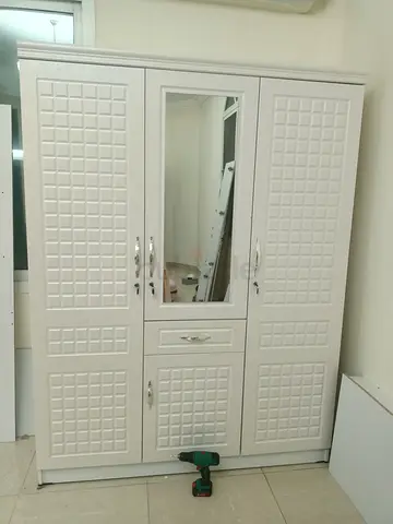 Hi available brand new 3 door cabinet all color available